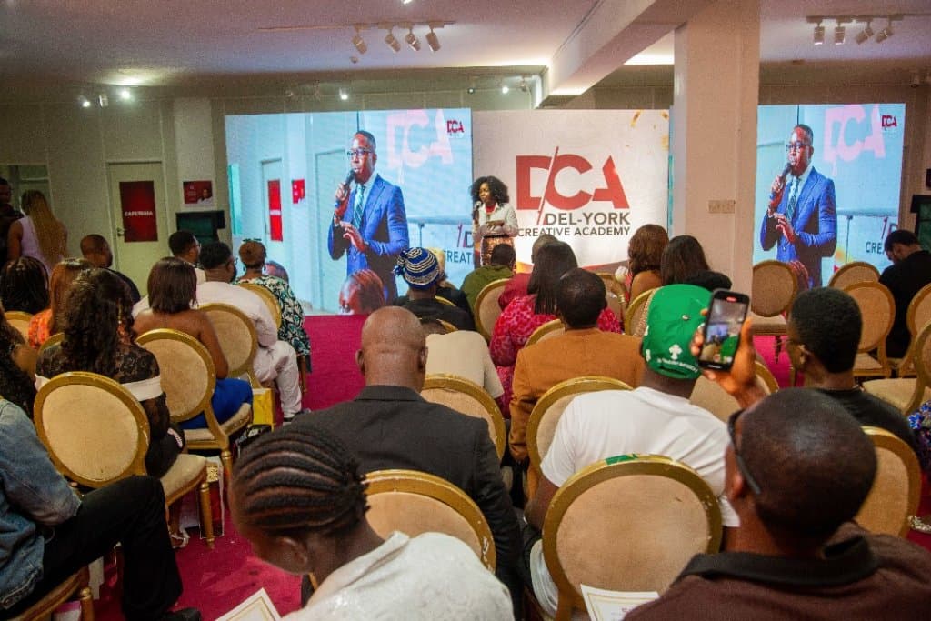 Head of Brand &amp; Business, Mrs Uzo Orimalade congratulating the Del-York graduates.